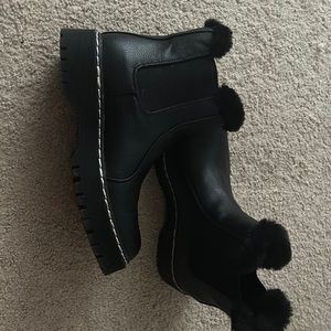 Leather black boots.